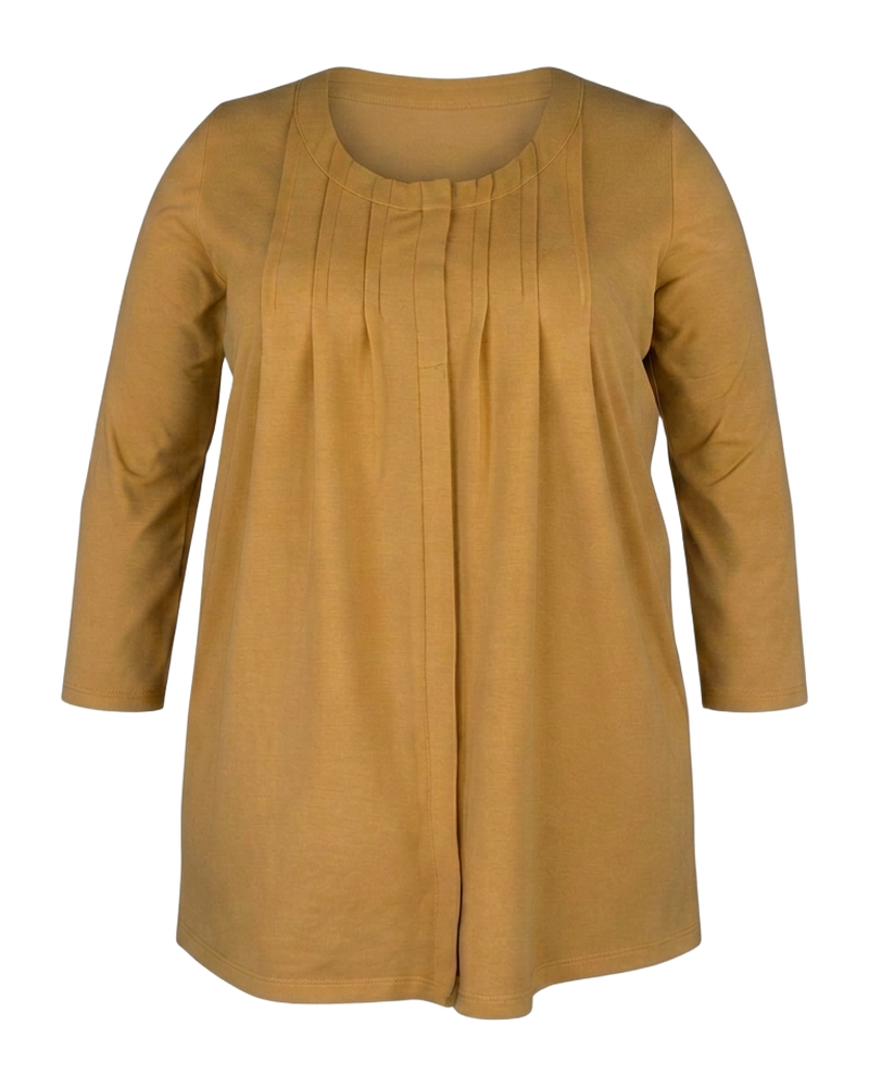 Pleated garment in mustard